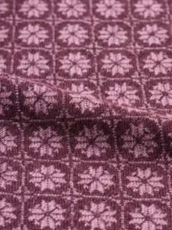 Bluse i merinould med nordisk mønster til baby