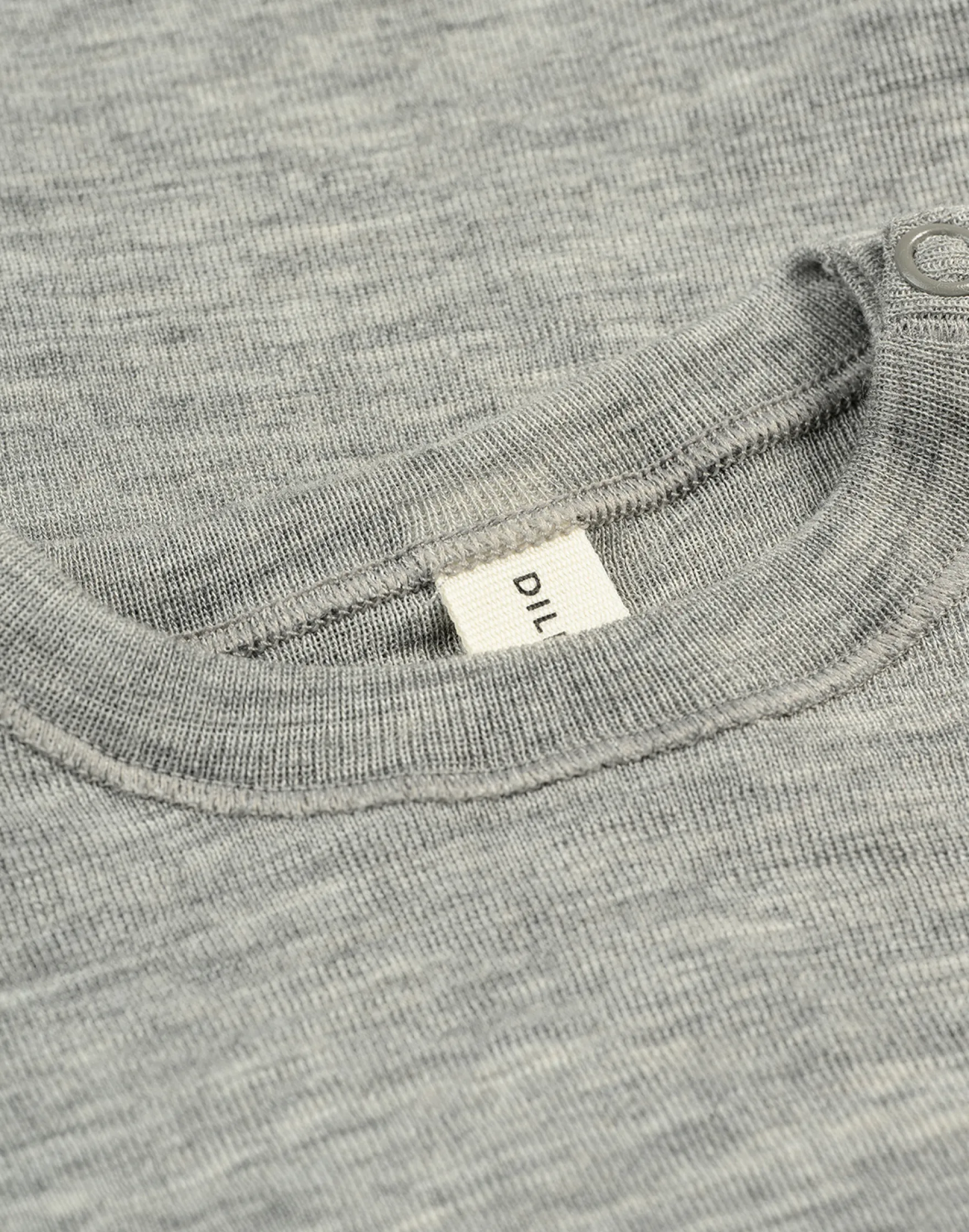 Bluse i merinould/silke til baby