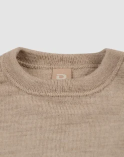 Bluse i merinould til baby