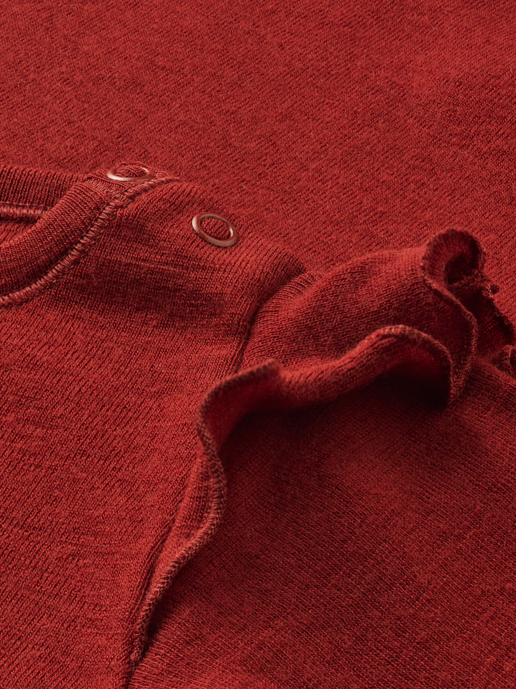 Bluse i merinould til baby