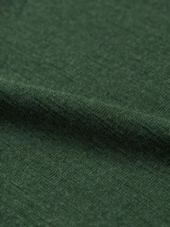 Bluse i merinould til baby