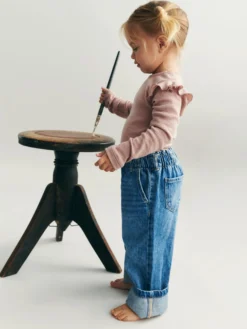 Bluse i merinould til baby
