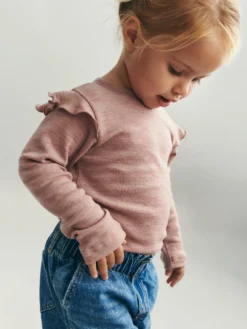 Bluse i merinould til baby