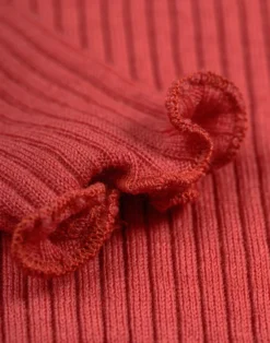 Bluse med flæser i merinould til baby