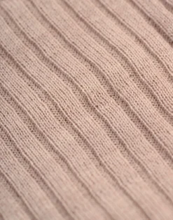 Bluse med flæser i merinould til baby