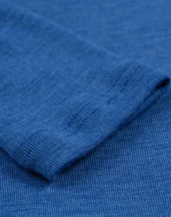 Bluse med høj hals i merinould til kvinder