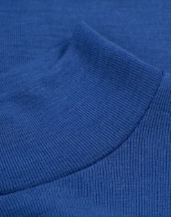 Bluse med høj hals i merinould til kvinder