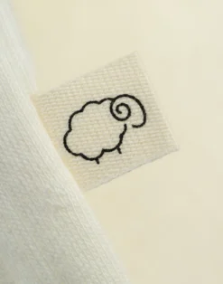 Bluse med hulmønster i bomuld til baby
