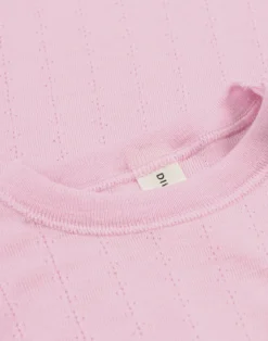 Bluse med hulmønster i merinould/silke til baby