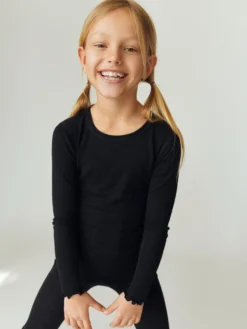Bluse med hulmønster i merinould/silke til børn