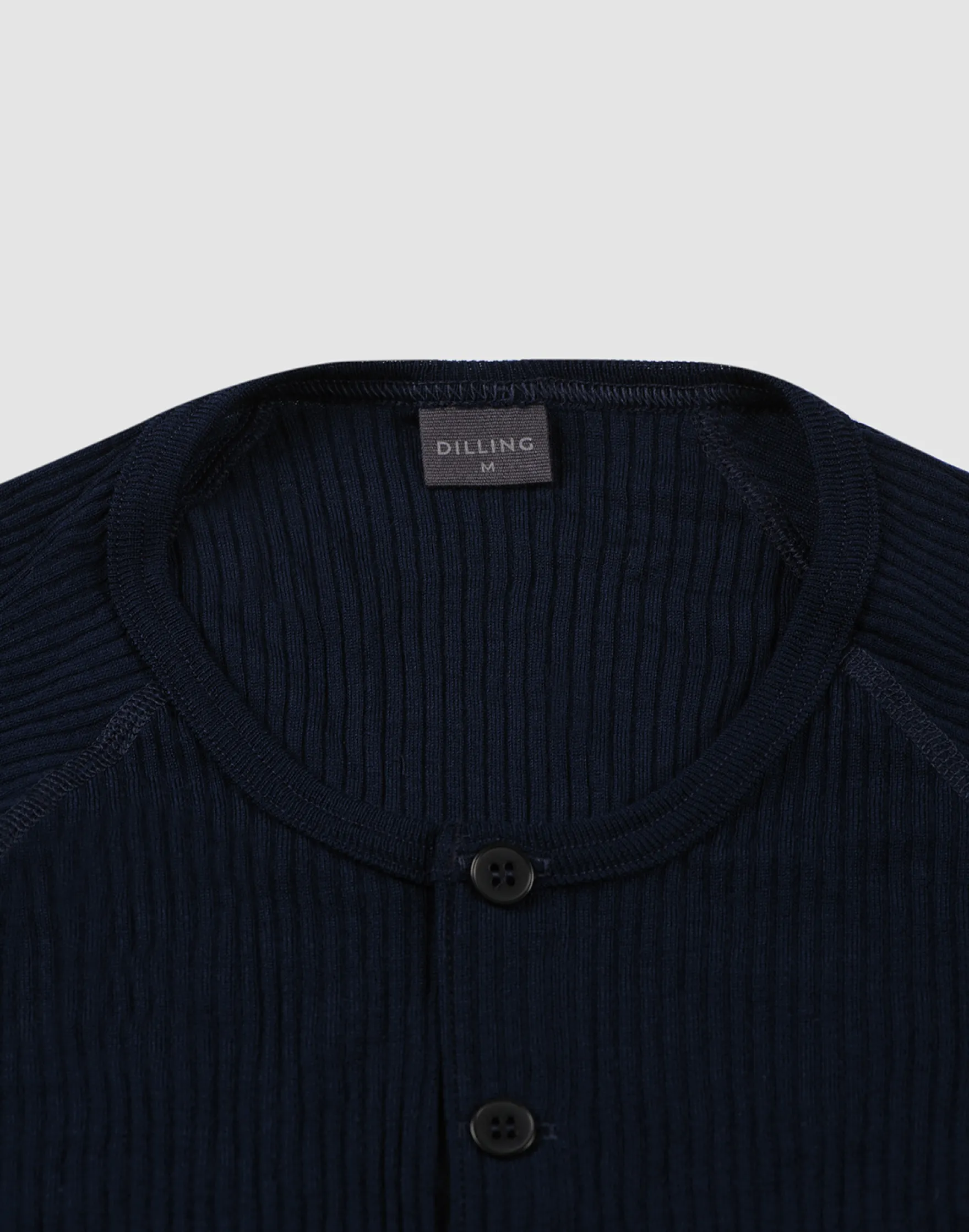 Bluse med knapper i merinould til mænd