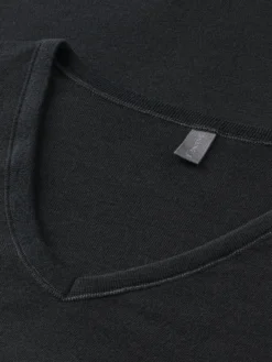 Bluse med V-hals i merinould til kvinder