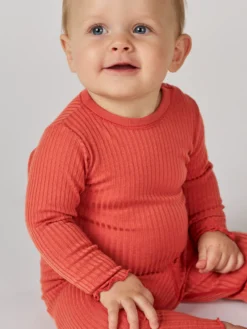 Body med lange ærmer i merinould til baby