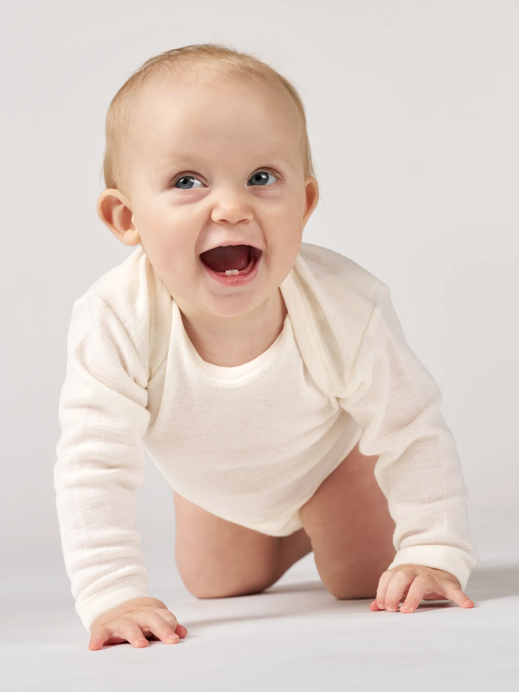 Body med lange ærmer i merinould til baby