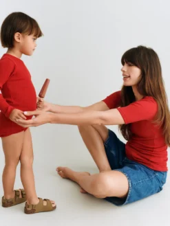 Body med lange ærmer i merinould til baby
