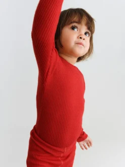 Body med lange ærmer i merinould til baby