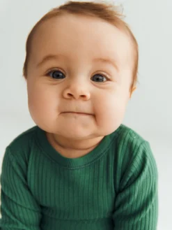Body med lange ærmer i merinould til baby