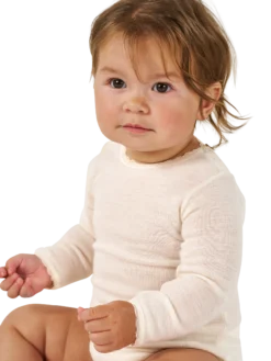 Body med lange ærmer i merinould til baby