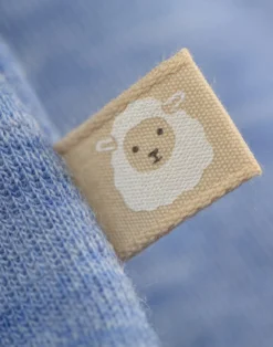 Body uden ærmer i merinould til baby