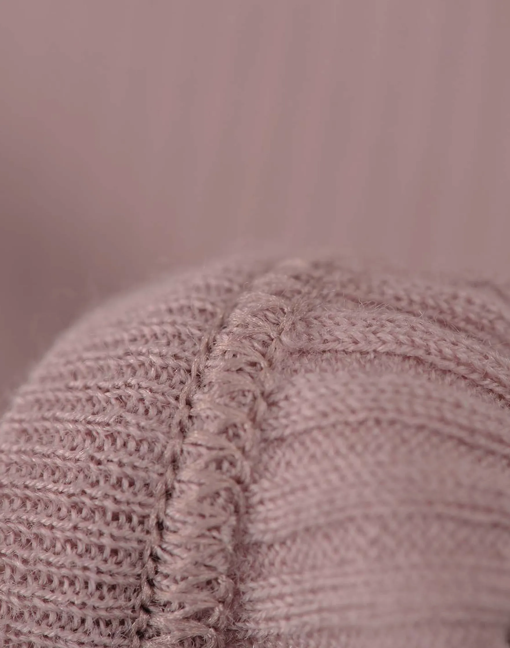 Body uden ærmer i merinould til baby