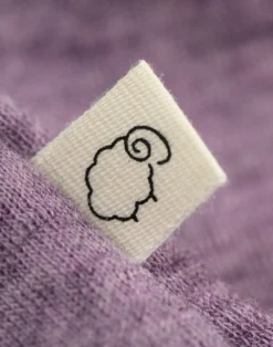 Body uden ærmer i merinould til baby