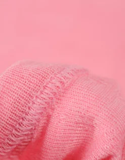 Body uden ærmer med hulmønster i merinould/silke til baby