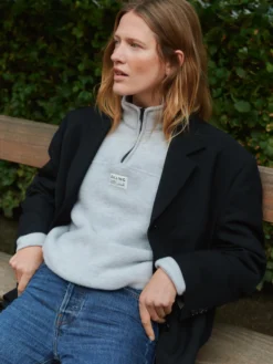 Half-zip-jakke i merinouldfleece til kvinder