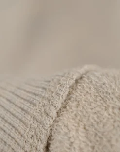 Heldragt i merinouldfrotté til baby