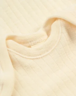 Heldragt i merinould til baby