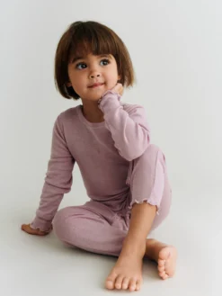 Heldragt med hulmønster i merinould/silke til baby