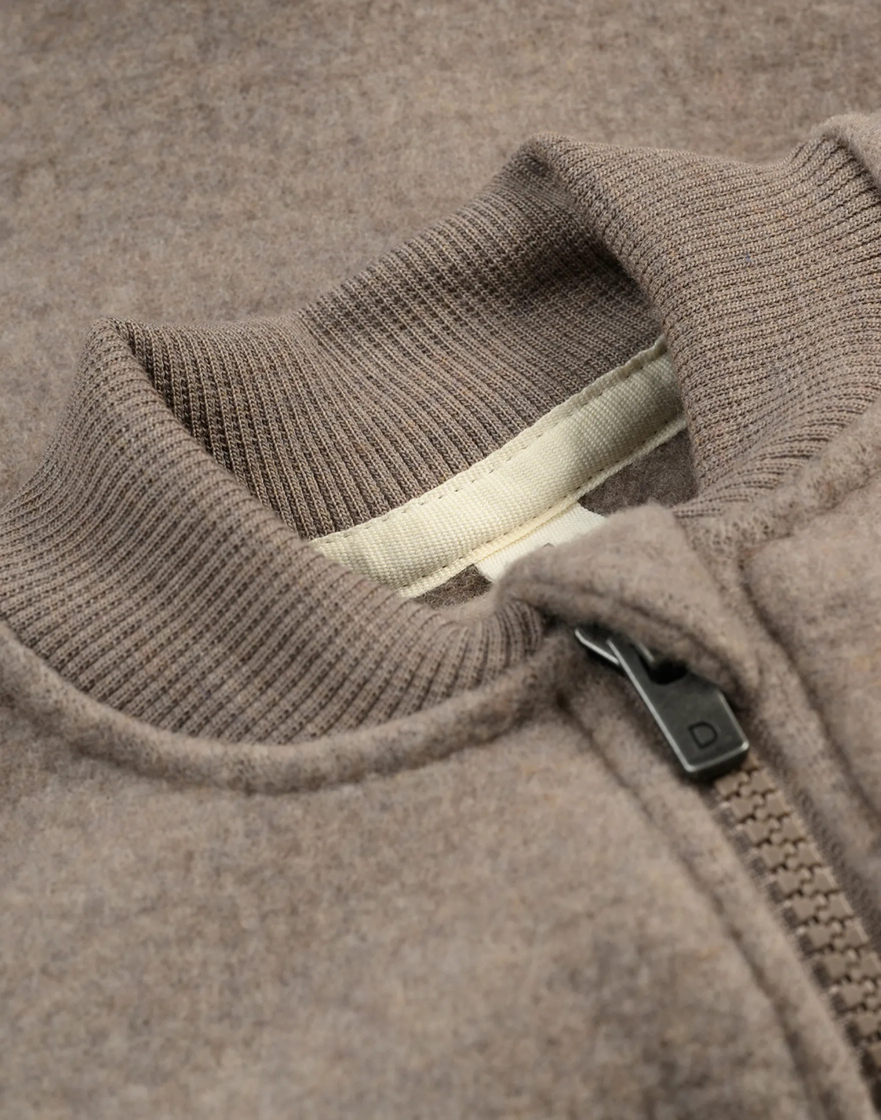 Jakke i merinouldfleece til baby