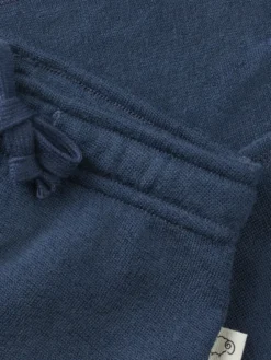 Joggers i merinouldfrotté til baby