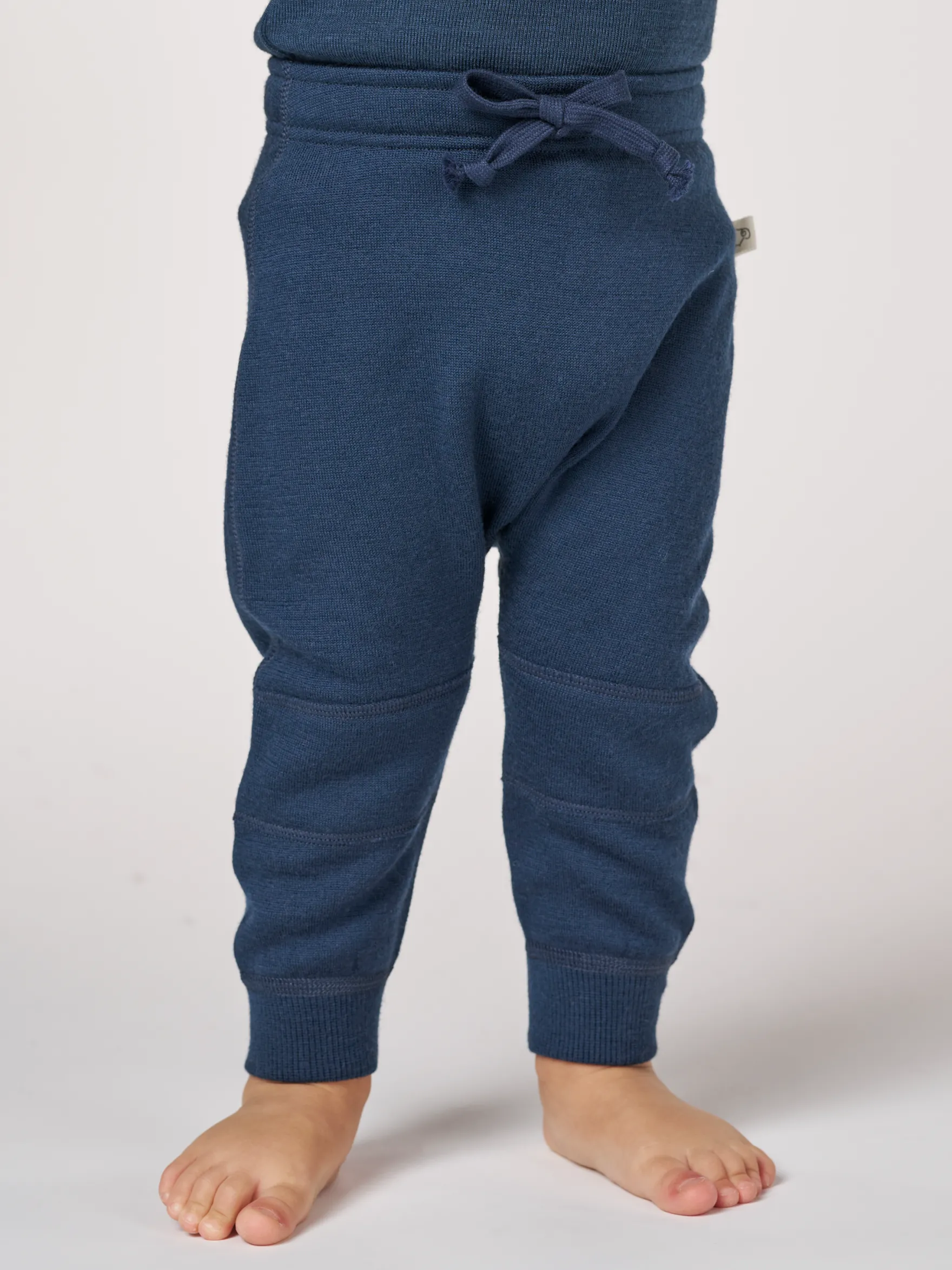 Joggers med knæpatch i merinouldfrotté til baby