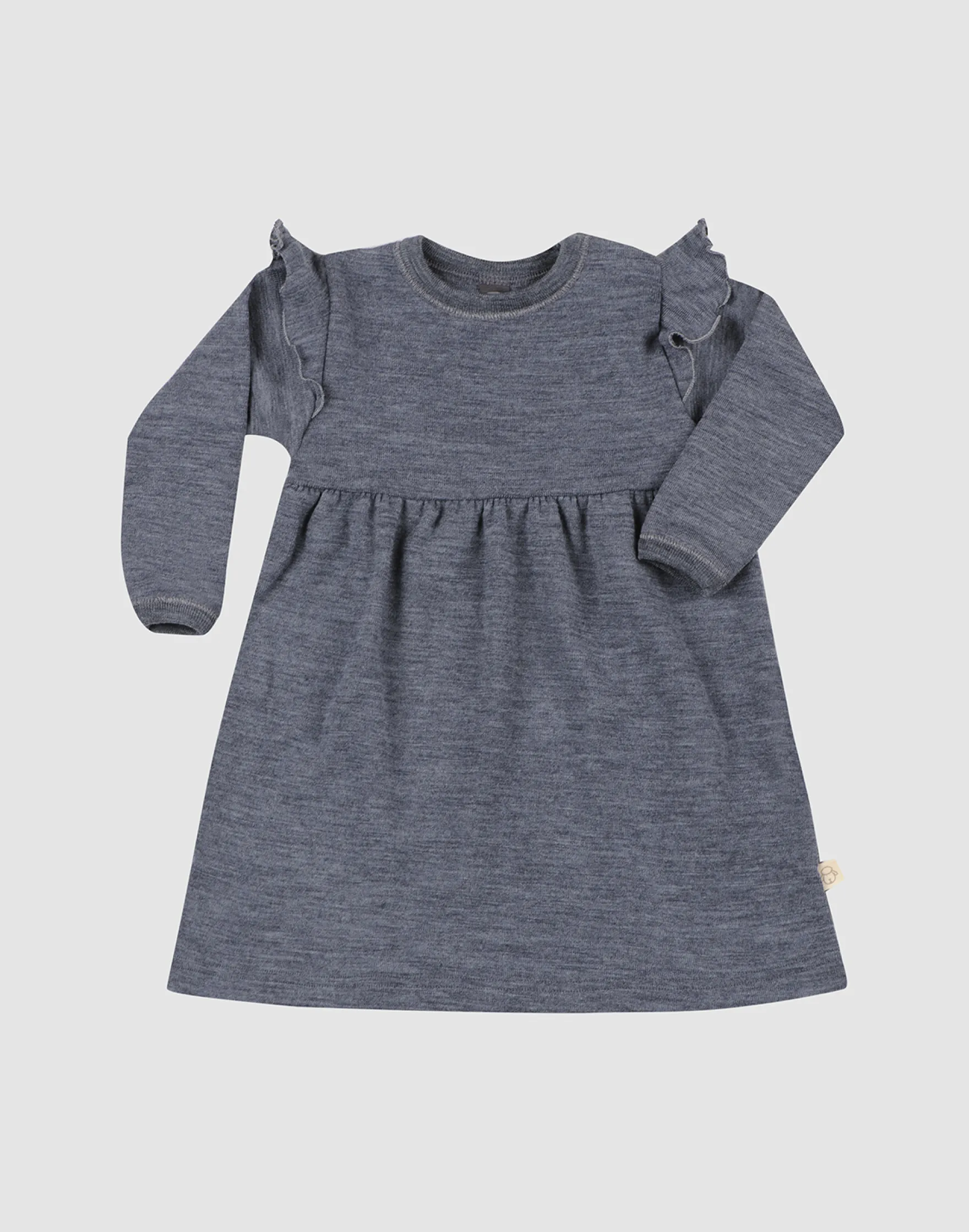 Kjole med flæser i merinould til baby