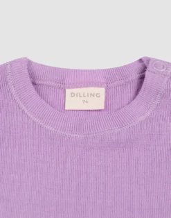 Kjole med flæser i merinould til baby