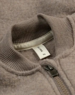Køredragt i merinouldfleece til baby