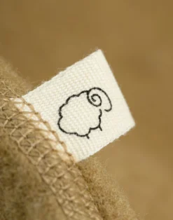 Køredragt med hætte i merinouldfleece til baby