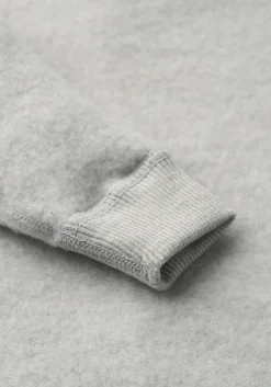 Køredragt med hætte i merinouldfleece til baby