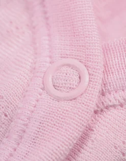 Langærmet body med hulmønster i merinould/silke til baby
