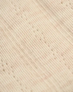 Leggings i merinould med hulmønster til baby
