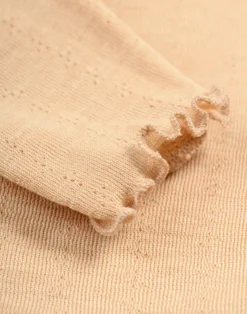 Leggings med hulmønster i merinould/silke til baby