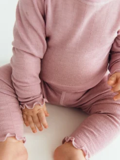 Leggings med hulmønster i merinould/silke til baby
