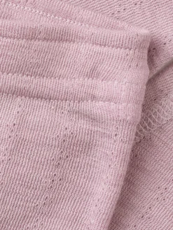 Leggings med hulmønster i merinould/silke til baby