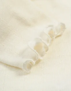 Leggings med hulmønster i merinould/silke til baby