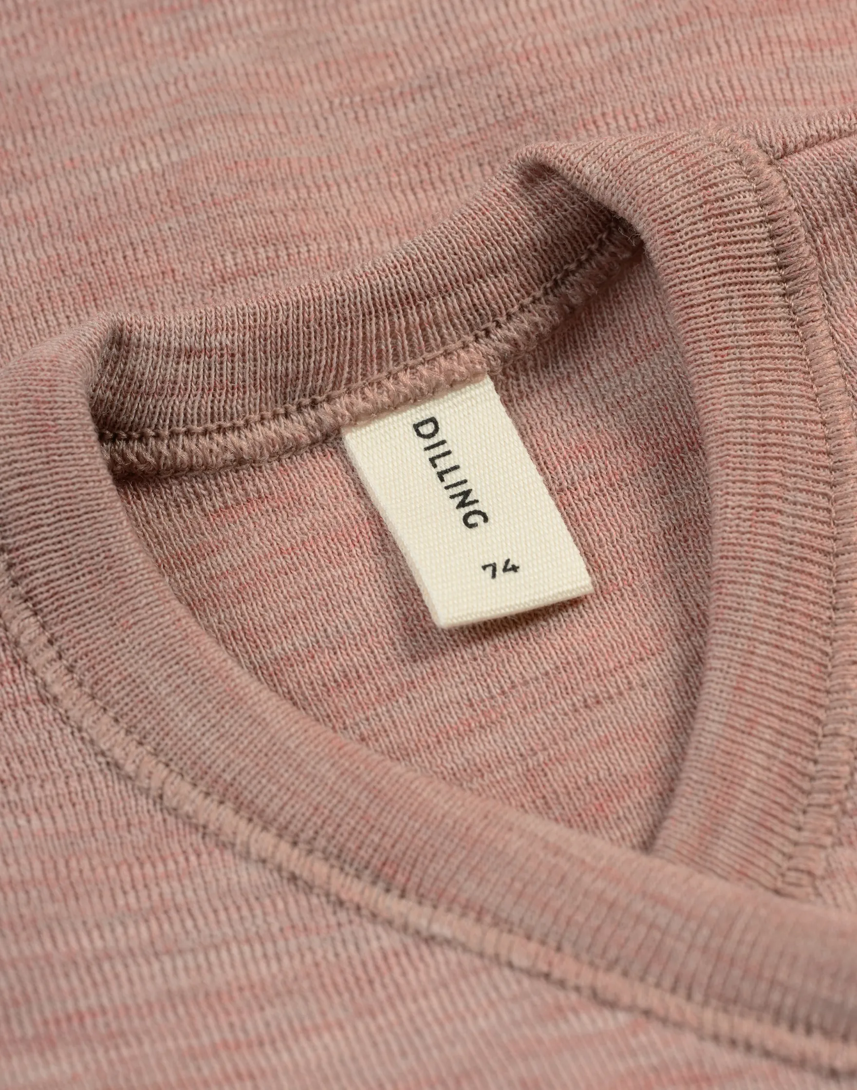Slå-om-bluse i merinould til baby