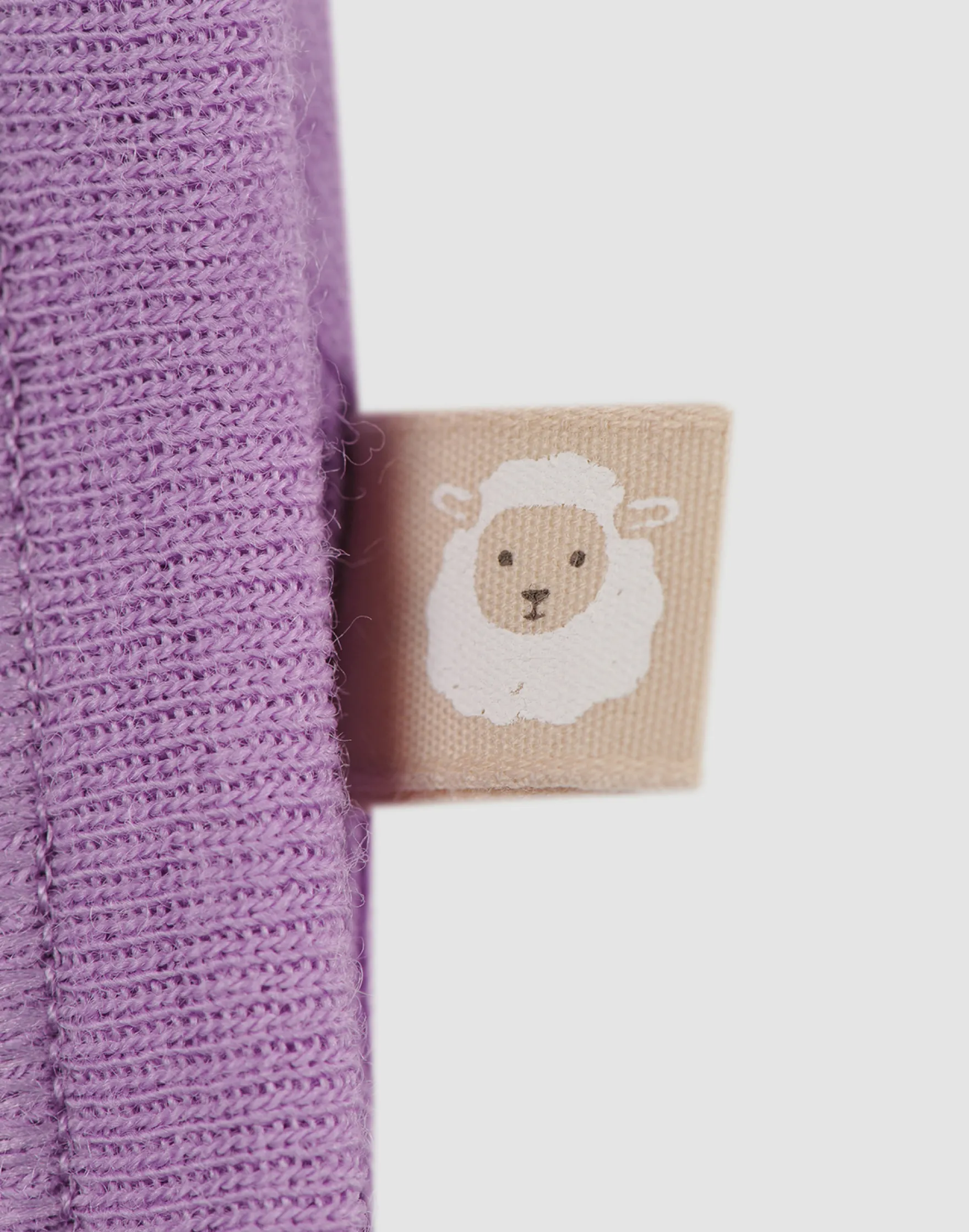 Slå-om body med lange ærmer i merinould til baby