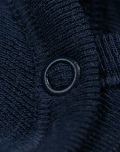 Slå-om body med lange ærmer i merinould til baby