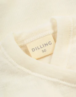 Slå-om singlet i merinould/silke til nyfødt