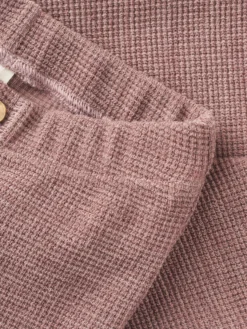 Vaffelstrikket bukser i merinould til baby